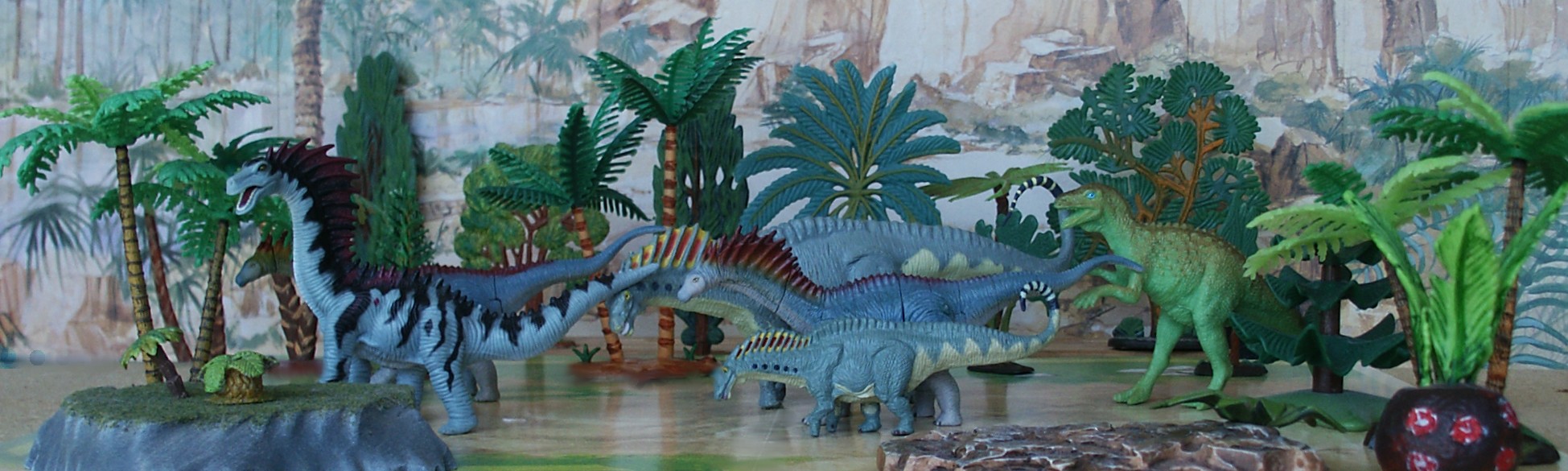 The Amargasaurus from Chap Mei , FameMaster 4D and the large and small Battat toy figures. 