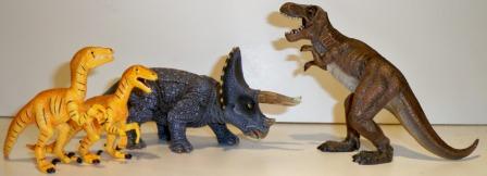 Mojo Triceratops, Tyrannosaurus and two Velociraptor 